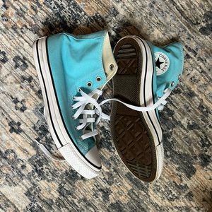 Light blue high top converse
